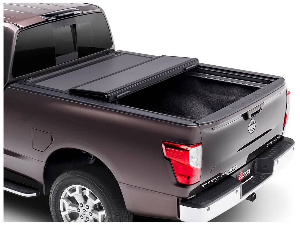 by RealTruck BAKFlip  Hard Folding Truck Bed Tonneau Cover | 448525 | Compatible with 2017 - 2023 Nissan Titan 5' 7" Bed (67")