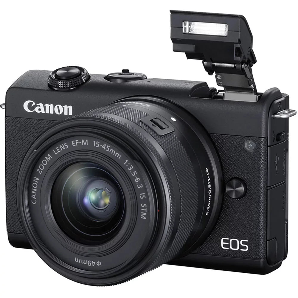 Ultimaxx Deluxe Canon   Mirrorless Camera w/ 15-45mm f/3.5-6.3   Lens Bundle - Includes: 64GB Ultra Memory Card, Digital Flash with Bracket & Much More