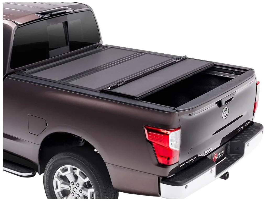 by RealTruck BAKFlip  Hard Folding Truck Bed Tonneau Cover | 448525 | Compatible with 2017 - 2023 Nissan Titan 5' 7" Bed (67")