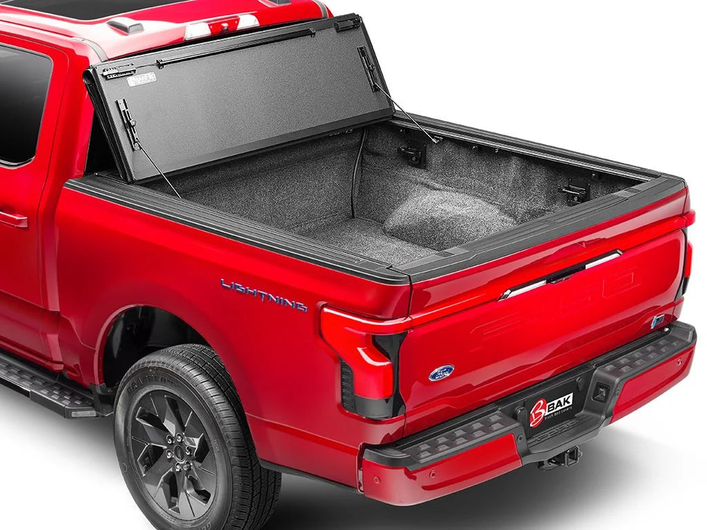 by RealTruck BAKFlip  Hard Folding Truck Bed Tonneau Cover | 448525 | Compatible with 2017 - 2023 Nissan Titan 5' 7" Bed (67")